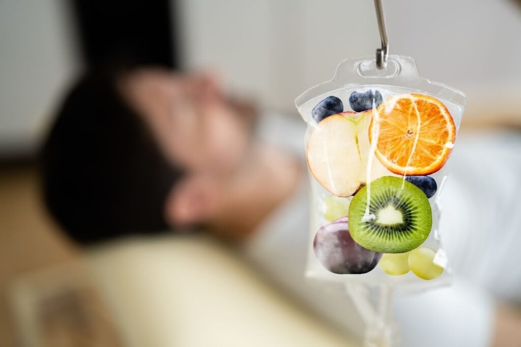 IV infusion bag with fruit imagery representing hydration and nutrient support using modern vitamin therapy delivery methods.